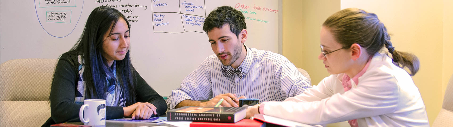 Photo of researchers working at desk